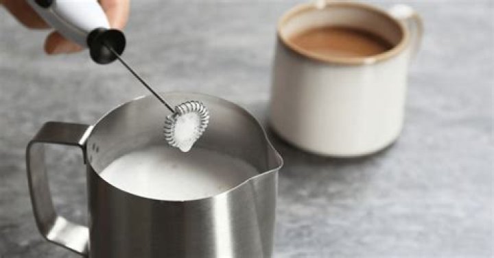 Does frothing milk heat it?
